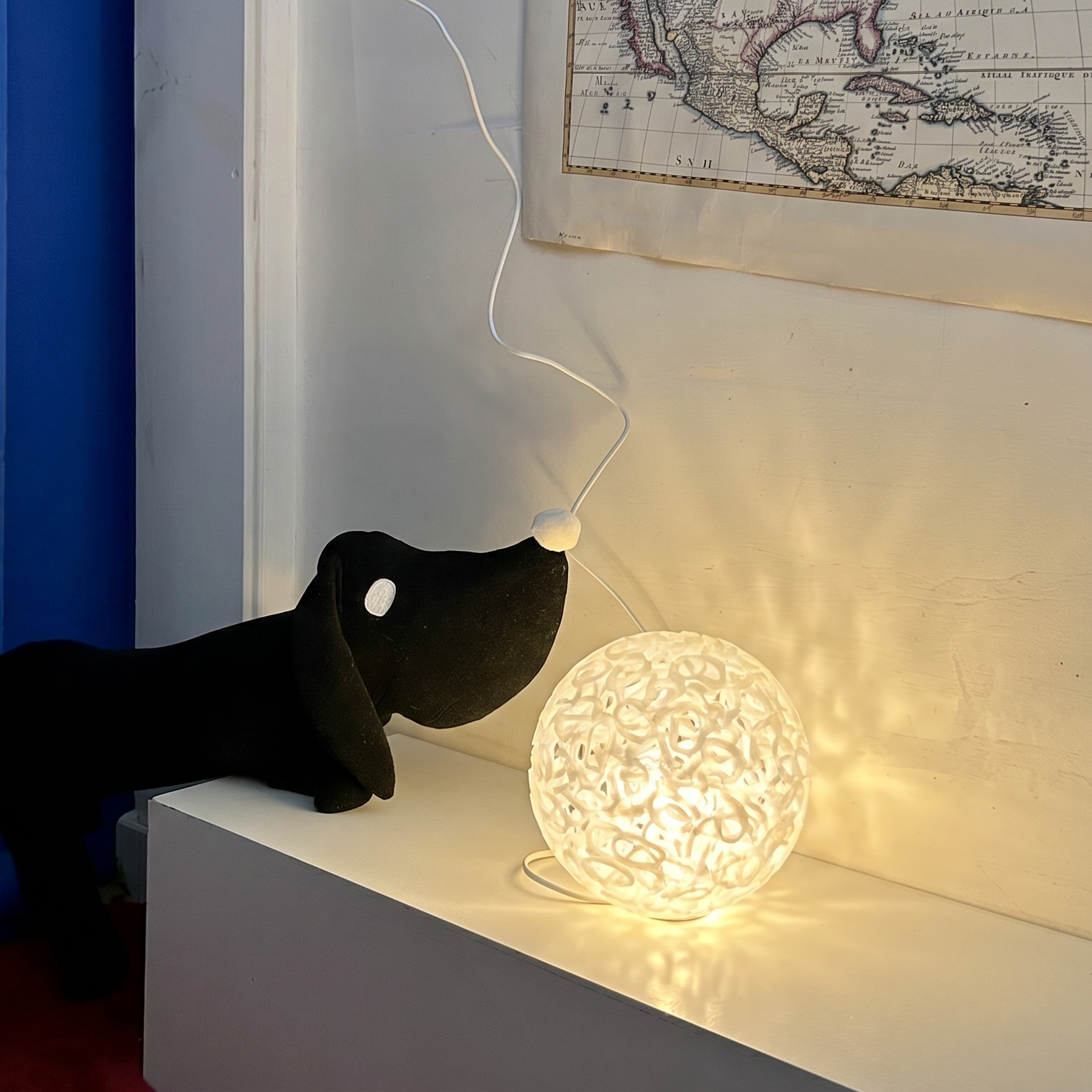 A glowing spherical lamp on a kids room